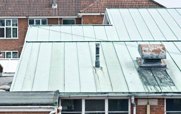 Scales lead roofing costs
